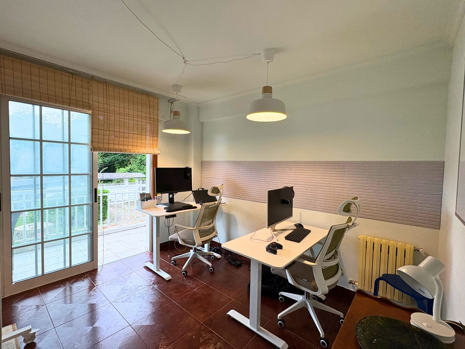 Coworking desks set up indoors with natural light